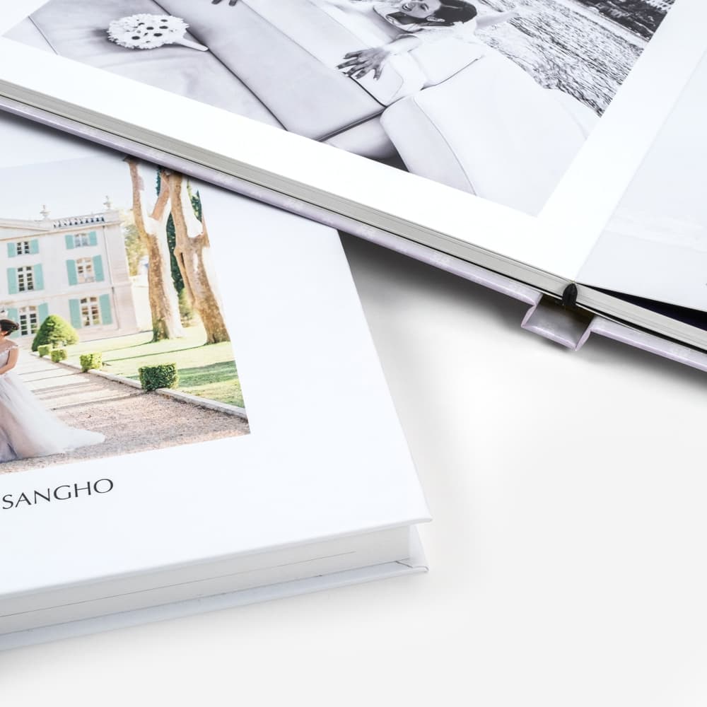 Detalle del papel fotográfico y encuadernación de álbum de boda profesional